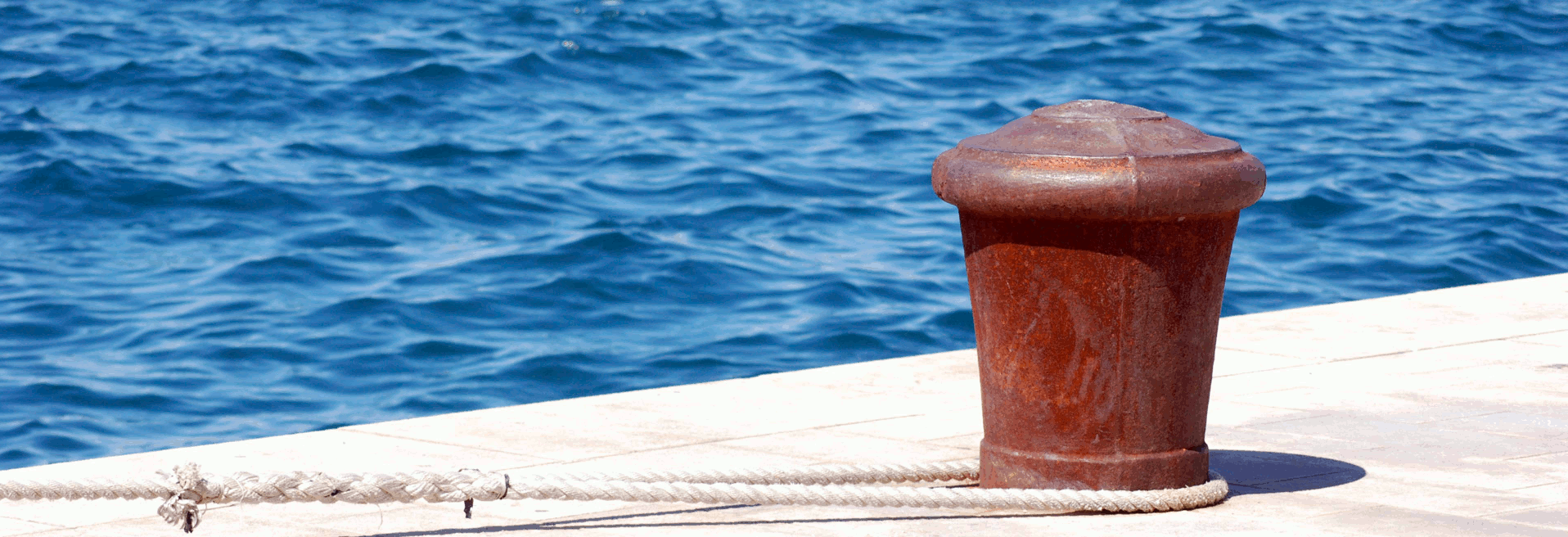 Bollard by the Sea by Gábor Szakács (Public Domain)